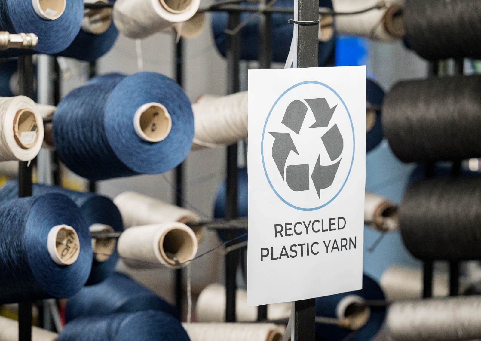 recycling logo amongst yarn