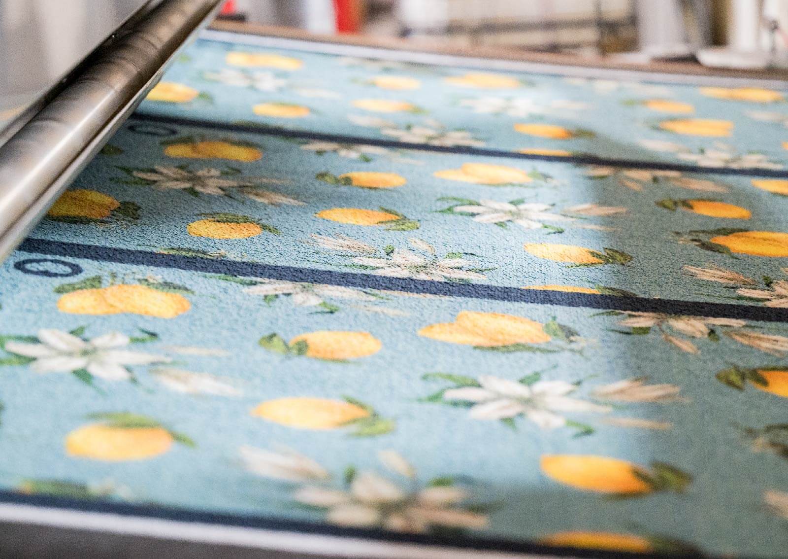 blue and yellow doormat with lemons