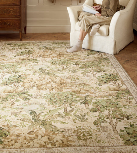 Sanderson By Highgrove x Hug Rug Eco-Washable The Stumpery Lichen with a nature inspired pattern, styled on wooden flooring.