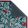 Sanderson By Highgrove x Hug Rug Ancient Apple Tree Midnight with an apple tree design showing rubber backing.
