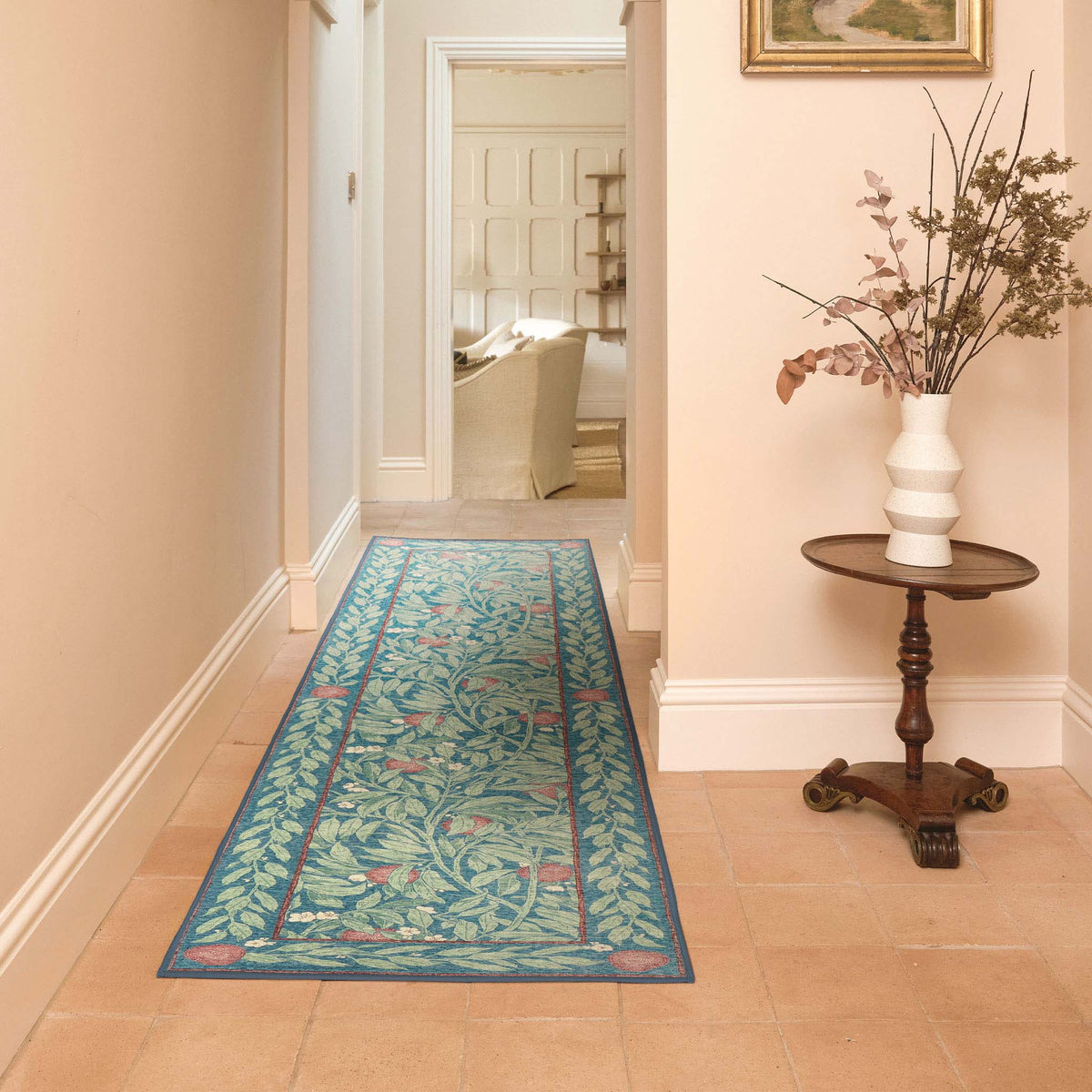 Sanderson By Highgrove x Hug Rug Eco-Washable Ancient Apple Tree Midnight Runner with an apple tree design, styled on tield flooring.