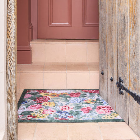 Sanderson By Highgrove x Hug Rug Antique Hydrangea & Rose with a floral design, styled by tile steps.