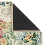 Close-up of Sanderson By Highgrove x Hug Rug Antique Hydrangea & Rose with a floral design showing rubber backing.