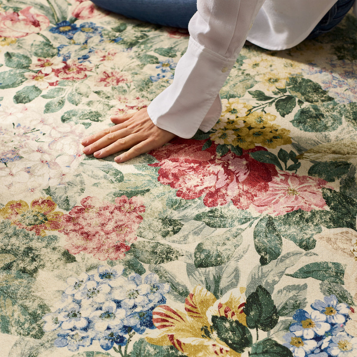 Close-up of Sanderson By Highgrove x Hug Rug Antique Hydrangea & Rose with a floral design.