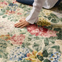 Close-up of Sanderson By Highgrove x Hug Rug Antique Hydrangea & Rose with a floral design.