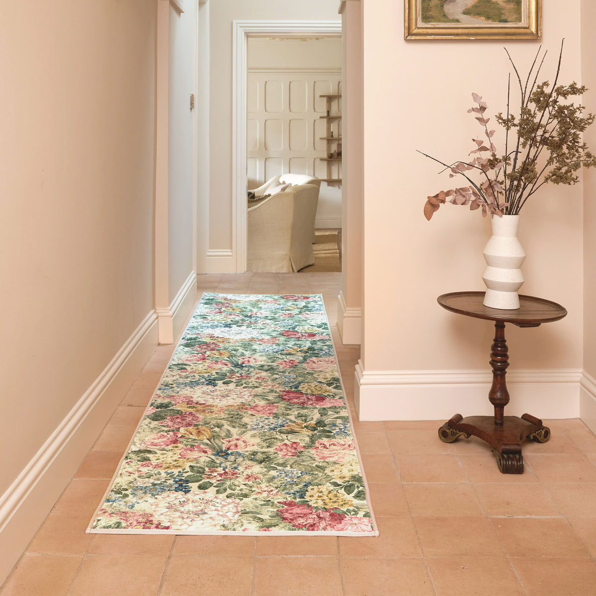 Sanderson By Highgrove x Hug Rug Antique Hydrangea & Rose Runner with a floral design, styled on tiled flooring.