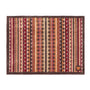 A rectangular doormat with a multicolor Southwestern-style geometric pattern featuring vertical stripes of red, orange, brown, beige, and cream, finished with a dark brown border.