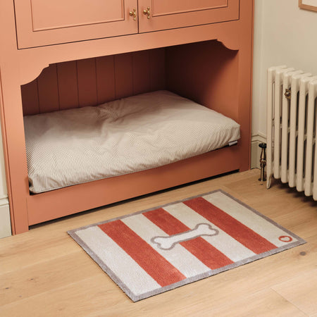 Bone Stripe Rust- 100% recycled cotton featuring a striped pattern with a bone in the centre.
