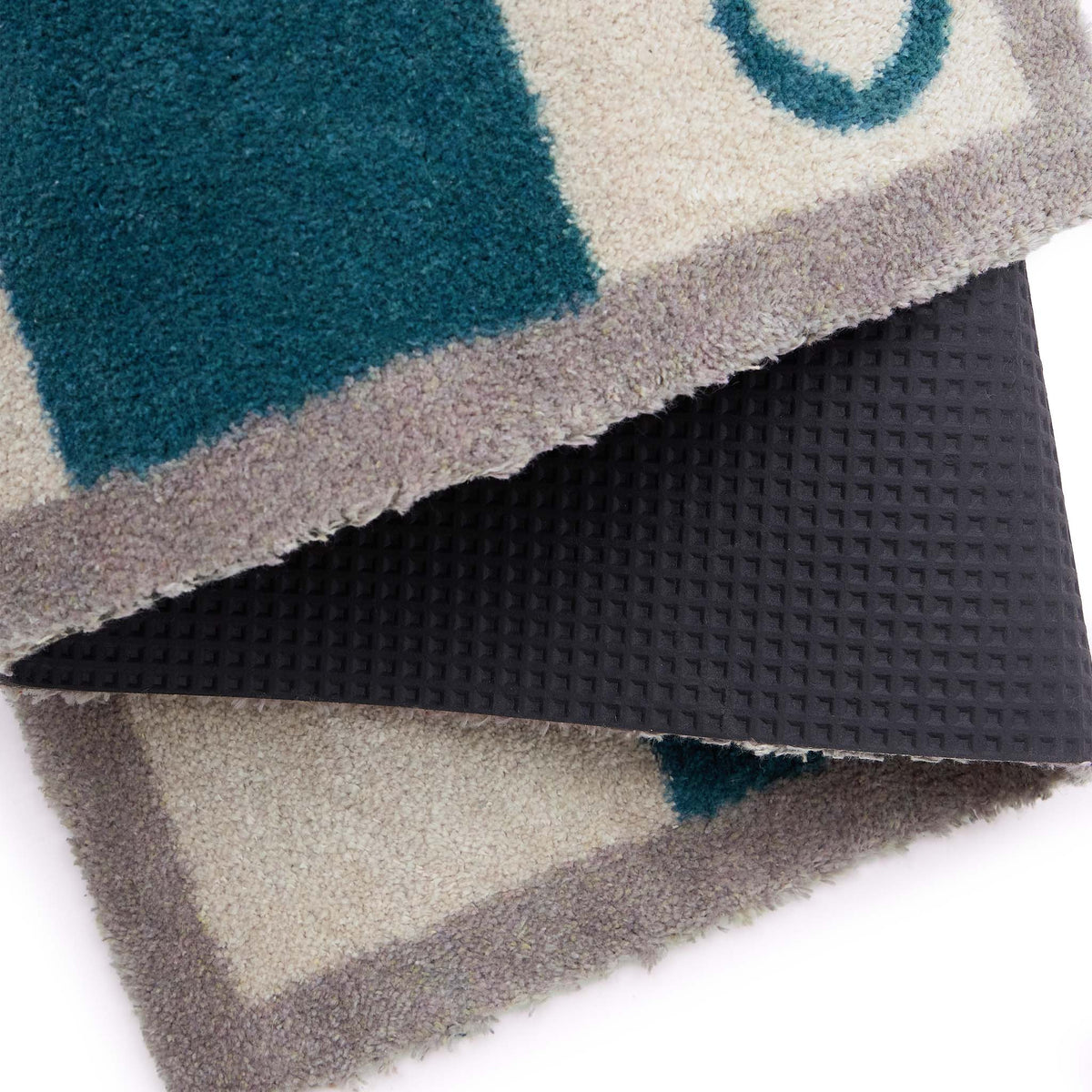 Bone Stripe Teal- 100% recycled cotton doormat featuring a striped pattern with a bone in the centre.