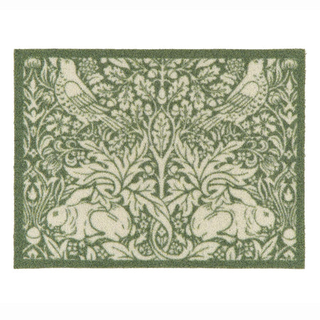 A rectangular outdoor doormat featuring a classic William Morris-style botanical and animal pattern with green and cream rabbits, birds, and foliage, shown flat against a white background.
