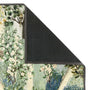 Close-up of Sanderson By Highgrove x Hug Rug Eco-Washable Carpet Garden Sanctuary with a nature inspired pattern showing the rubber backing.