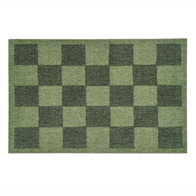 A rectangular green doormat with a checkerboard pattern in varying shades of olive and dark green, shown flat against a white background.