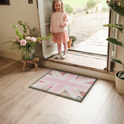 Country Rose Flag Doormat- 100% recycled cotton doormat featuring a pink union jack flag surround by florals.
