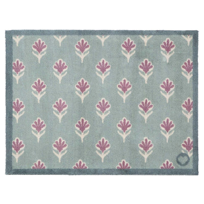 Ditsy Floral Green- 100% recycled cotton doormat featuring a woodblock pattern of purple flowers.