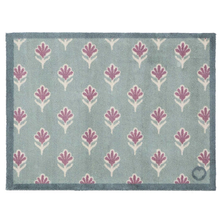 Ditsy Floral Green- 100% recycled cotton doormat featuring a woodblock pattern of purple flowers.