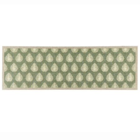 A rectangular runner with a repeating leaf pattern in sage green and cream, bordered by a cream edge, shown against a plain white background.