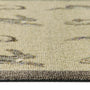 Close-up of a textured doormat showing a beige and taupe patterned surface with a dark charcoal border.