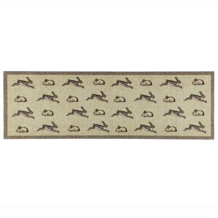 A rectangular runner with a repeating pattern of brown rabbits and hares on a light beige background, finished with a dark brown border.