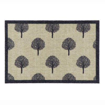A rectangular doormat with a natural beige textured background, featuring a repeating pattern of dark gray stylized tree silhouettes and a solid dark charcoal border.