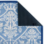 Sanderson By Highgrove x Hug Rug Highgrove Damask Tetbury Blue with a traditional style pattern showing the rubber backing.