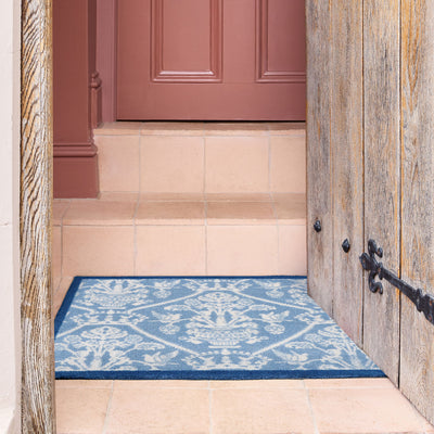 Sanderson By Highgrove x Hug Rug Highgrove Damask Tetbury Blue with a tradtional style pattern, styled on tiled flooring.