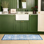 Sanderson By Highgrove x Hug Rug Highgrove Damask Tetbury Blue Runner with a traditional style pattern, styled in front a sink. 