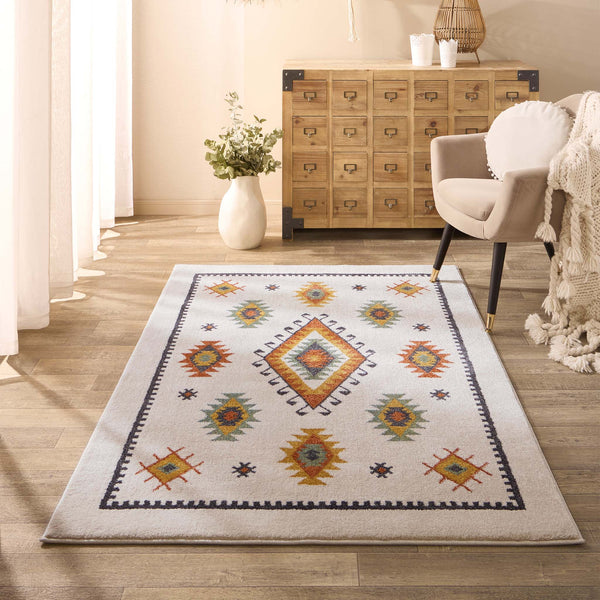 Izmir Cream Rug- 100% Polypropylene rug featuring a traditional tribal pattern. 