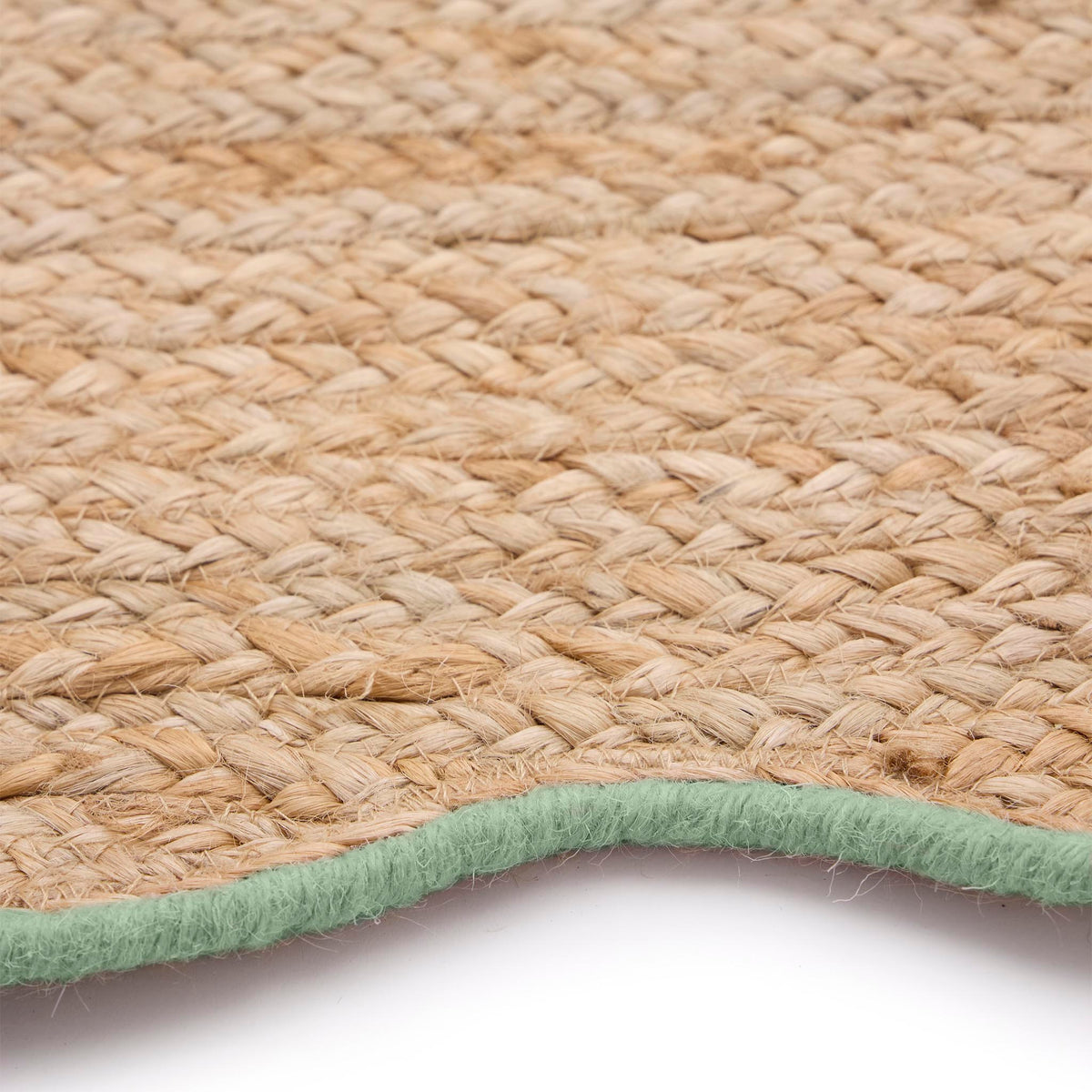 Jute Scalloped Edge Green Rug-  natural jute rug with a green wool whipped border.
