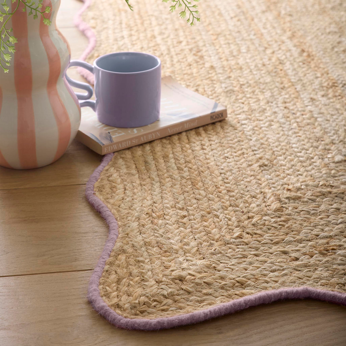 Jute Scalloped Edge Rug with Purple wool whipped border.