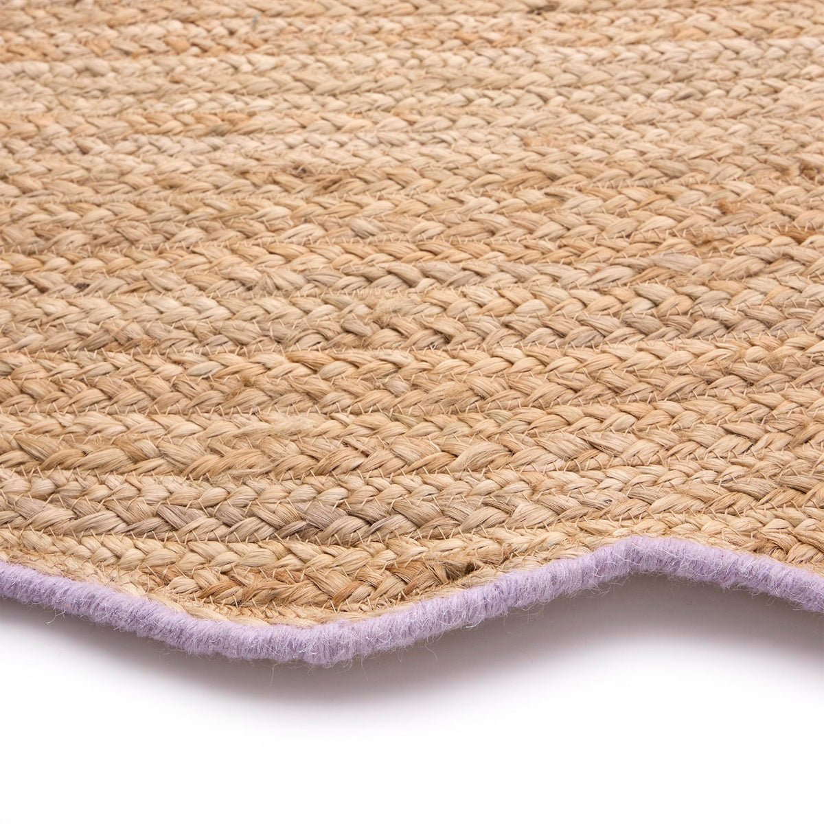 Jute Scalloped Edge Rug with Purple wool whipped border.
