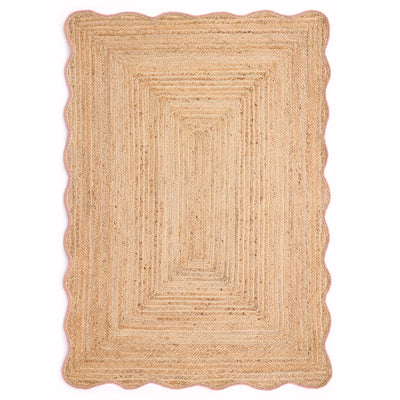 Jute Scalloped Edge Peach Rug- A jute rug with a pink wool wipped edge border.