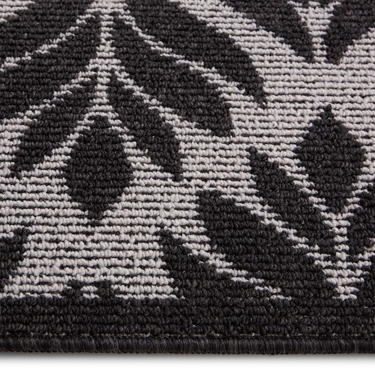 My Mat Stain Resistant Leaf Silver & Charcoal Detail. Washable doormat featuring a repeated leaf pattern against a silver background.