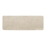 A rectangular shag area rug in a light beige or cream color, shown from a top-down view on a solid white background.