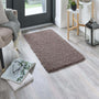 Howler and scratch shaggy pet mat in mocha brown styled in a doorway. 