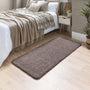 Howler and scratch shaggy pet mat in mocha brown styled in a bedroom. 