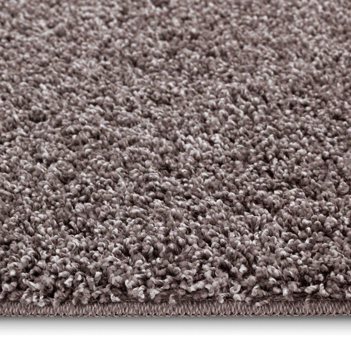 Detail image of Howler and scratch shaggy pet mat in mocha brown. 
