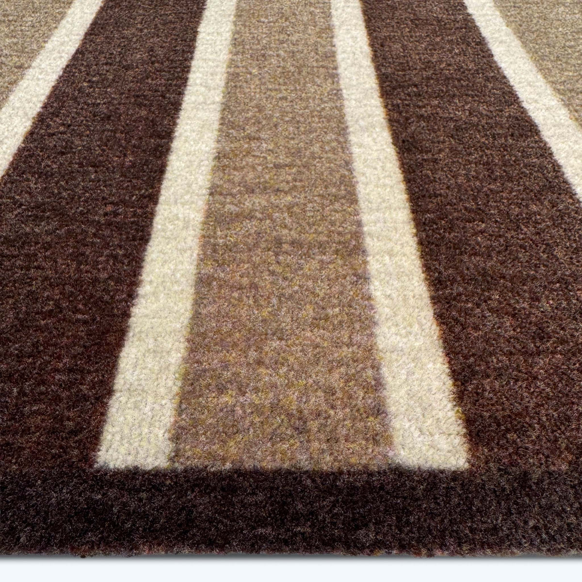 My Choclate Stripe- 100% recycled nylon doormat featuring brown and white stripes.