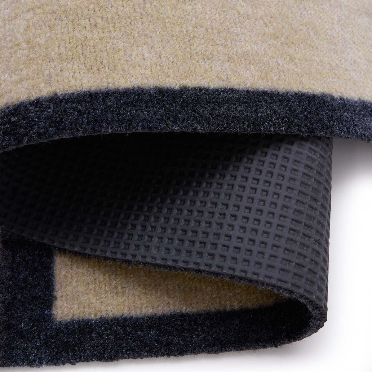 My Welcome Linear- 100% nylon doormat featuring the word 'welcome' against a cream background.