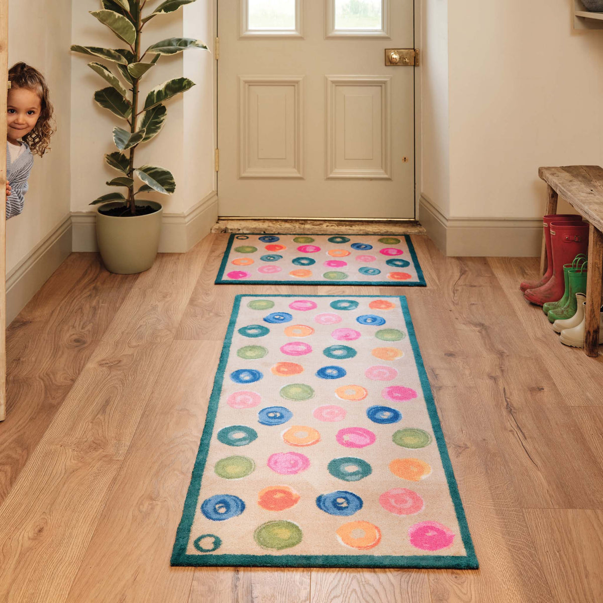 Painted Spots Multi- 100% recycled cotton doormat featuring painted spots.