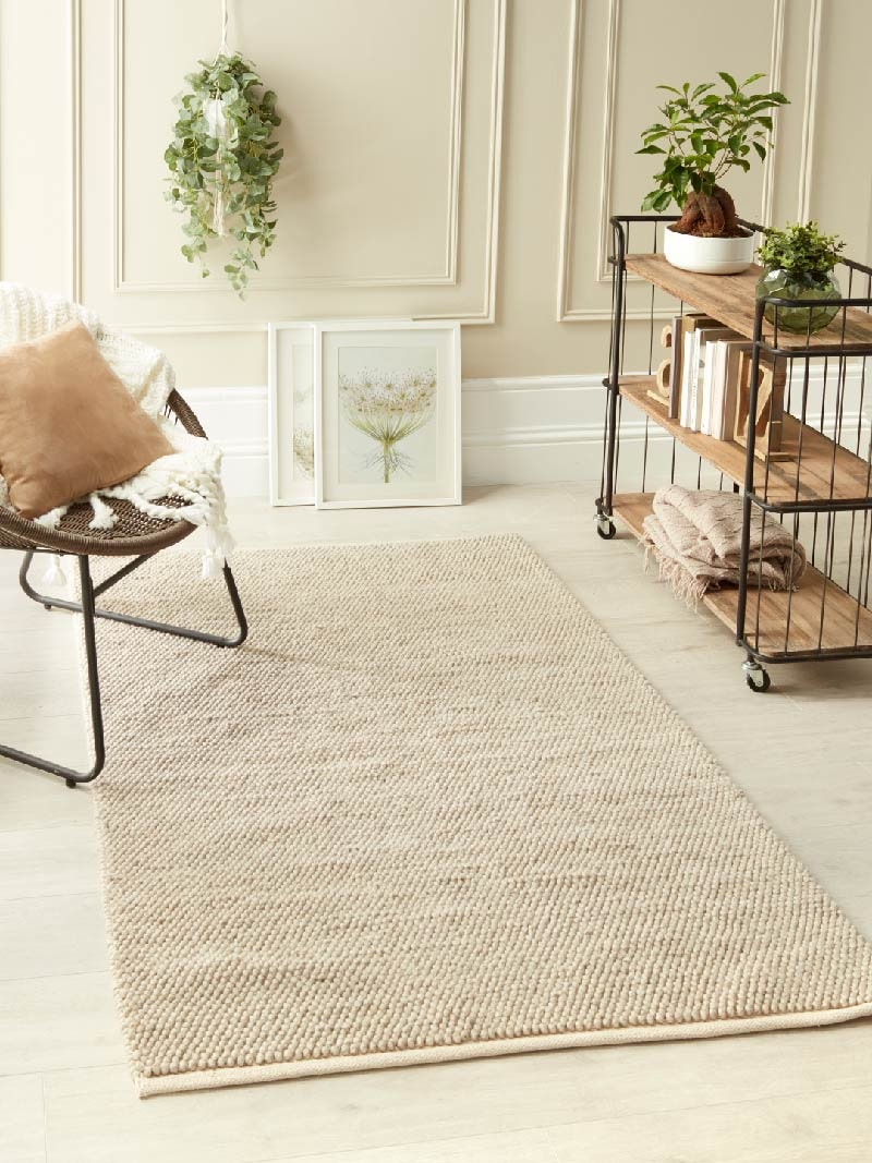 Large cream area rug from Origin Rugs, manufactured by Phoenox Textiles