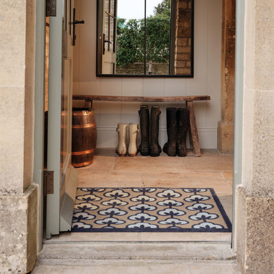 Retro Flower Neutral Doormat- 100% recycled cotton doormat featuring a retro floral pattern.
