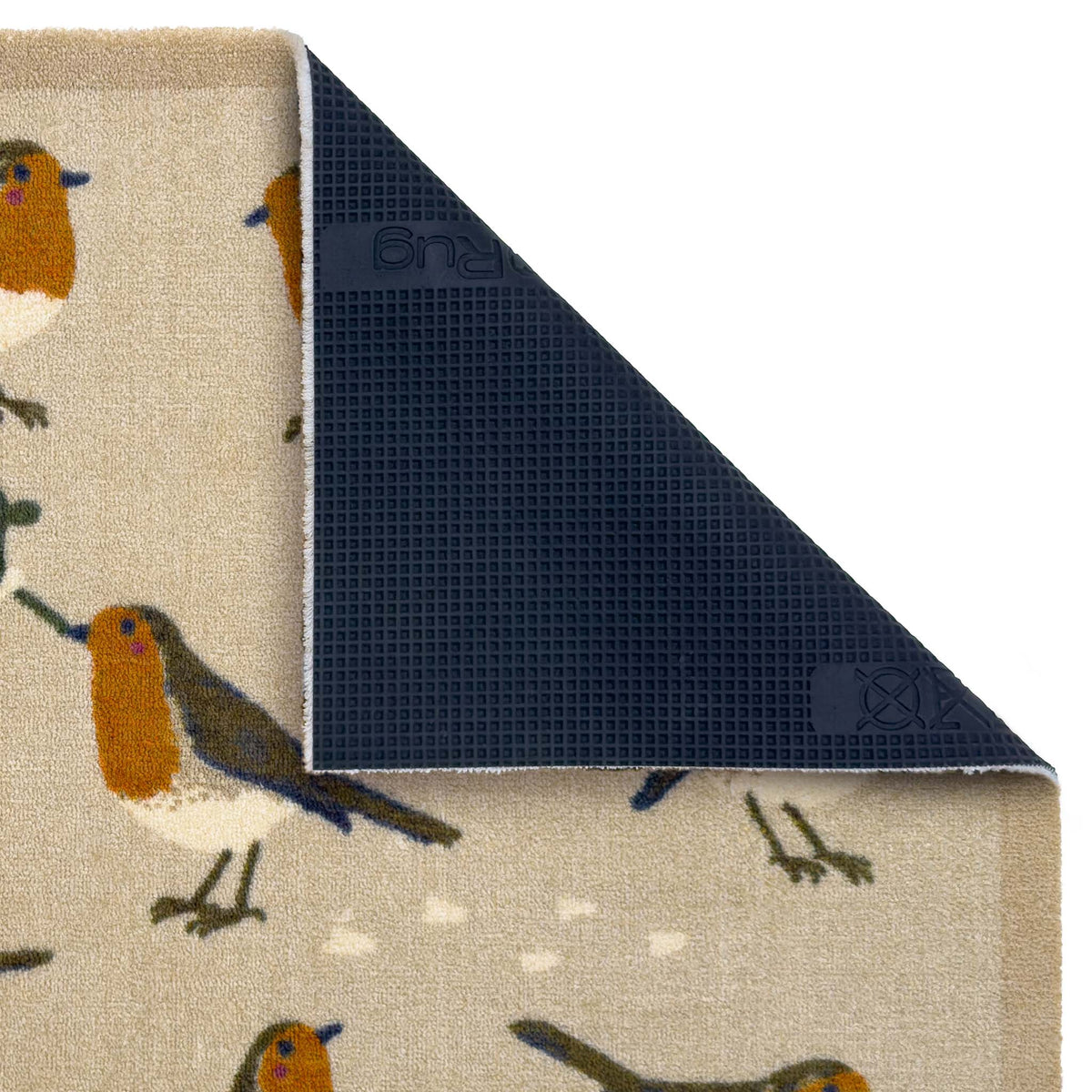 Close-up of a patterned doormat showing the top side with a beige background and robin bird print, plus the folded underside revealing a black backing.