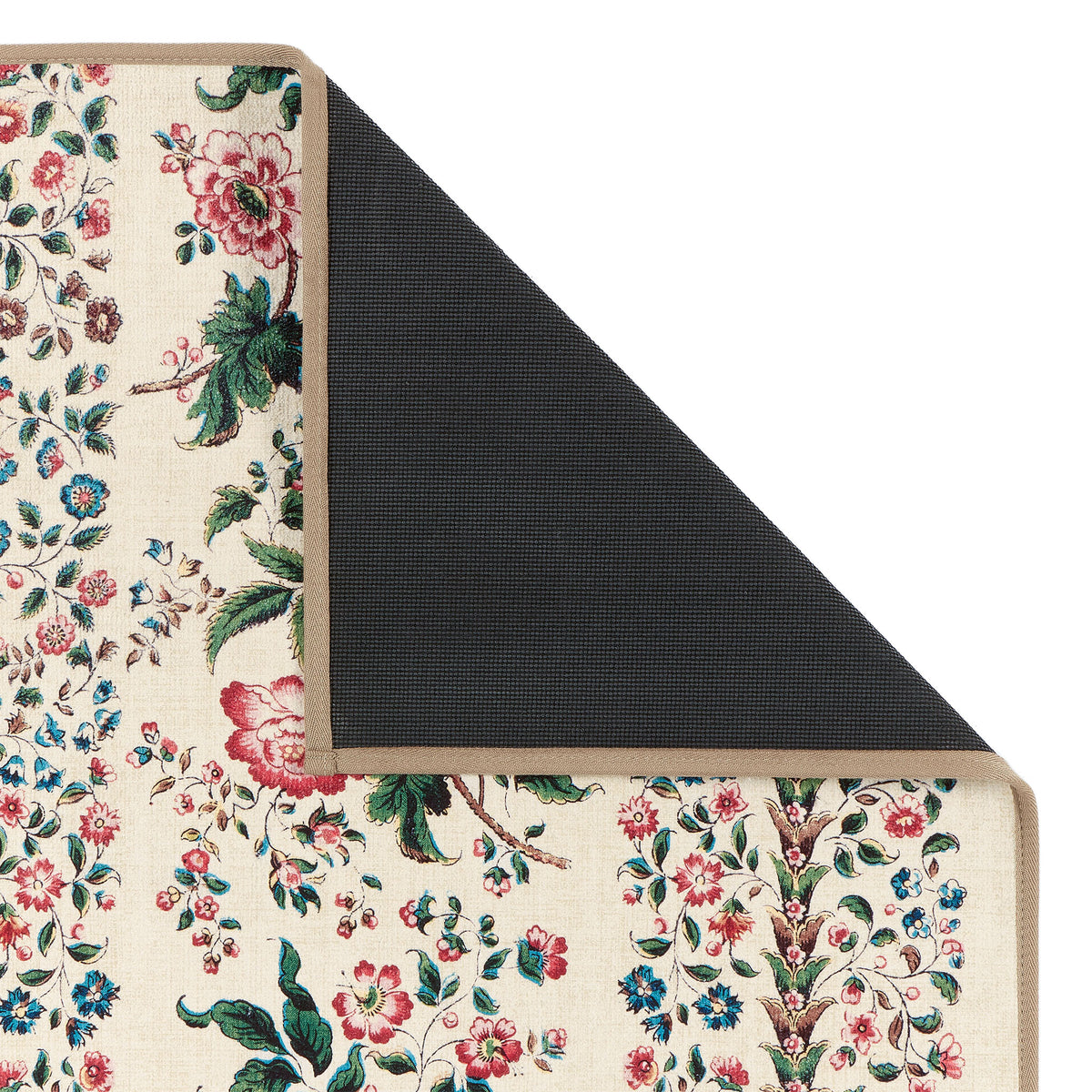 Close-up of Sanderson By Highgrove x Hug Rug Eco-Washable Rose Pergola Chintz Rug with a floral design showing rubber backing.