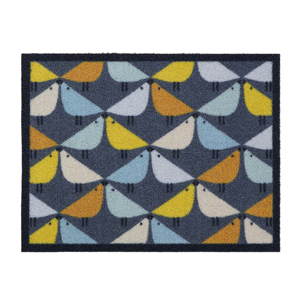 Hug Rug Outdoor Lintu Blue. Made from ECONYL regenrated yarn featuring Lintu Birds.