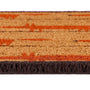 Close-up of a textured doormat with a natural coir background, rust-orange fox pattern, and dark brown fringe along the bottom edge.