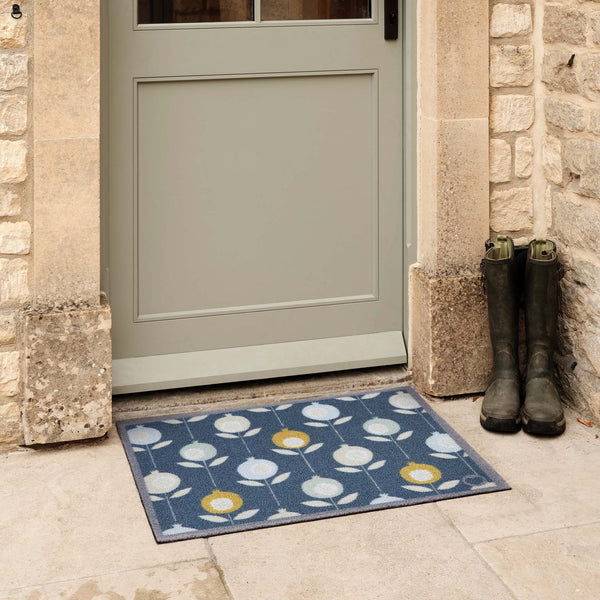 Pepino Blue Outdoor Doormat. Made from ECONYL regenerated yarn featuring a floral pattern.