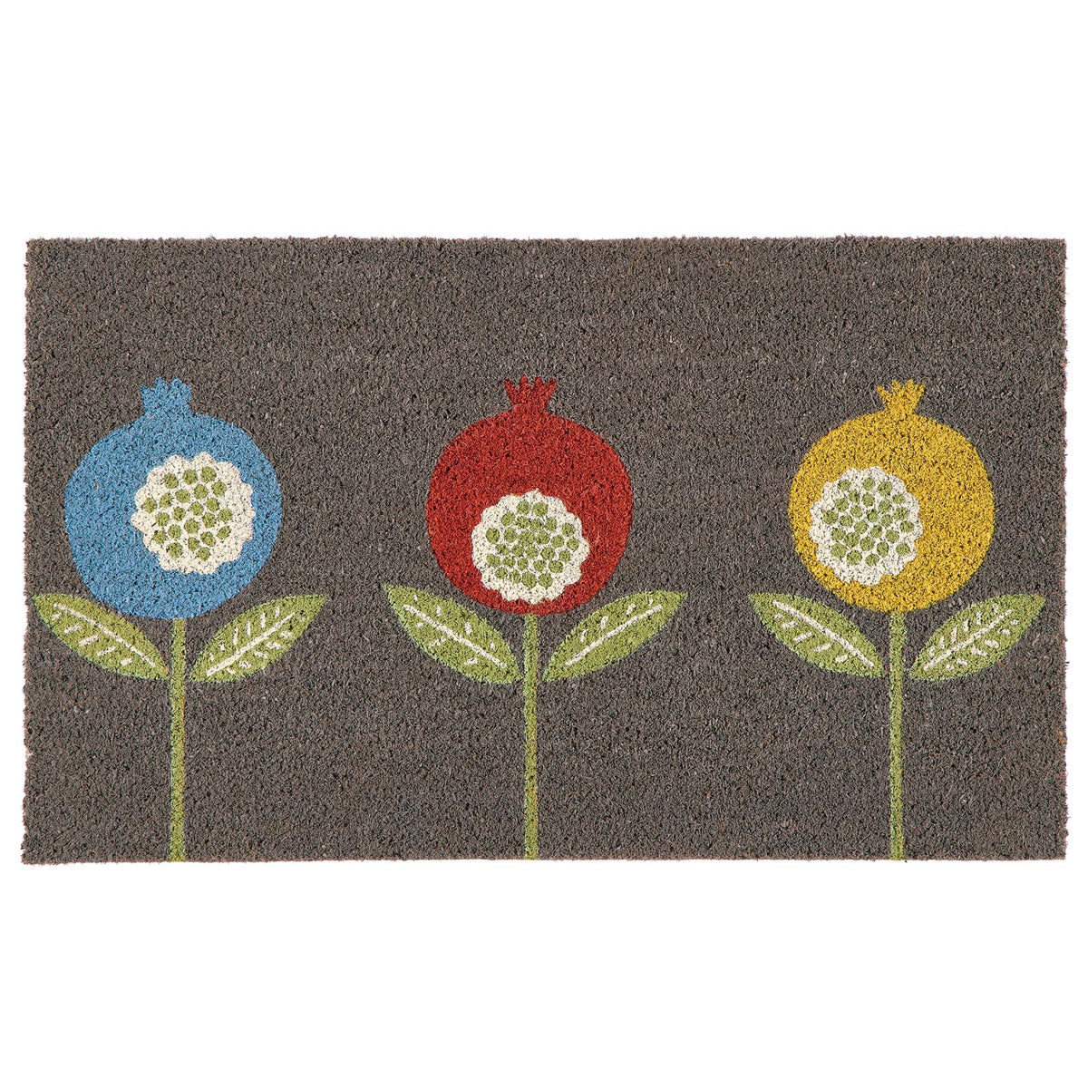 A rectangular grey coir doormat featuring a stylized pattern of three pomegranate-like flowers in blue, red, and yellow with green leaves and stems on a white background.