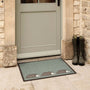 Spike Green Outdoor Doormat. Made from ECONYL regenerated yarn featuirng three hedgehogs.