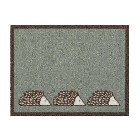 Spike Green Outdoor Doormat. Made from ECONYL regenerated yarn featuirng three hedgehogs.