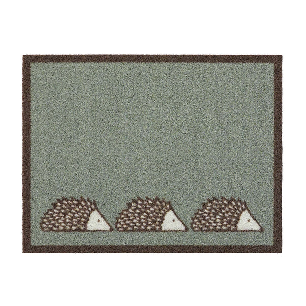 Spike Green Outdoor Doormat. Made from ECONYL regenerated yarn featuirng three hedgehogs.